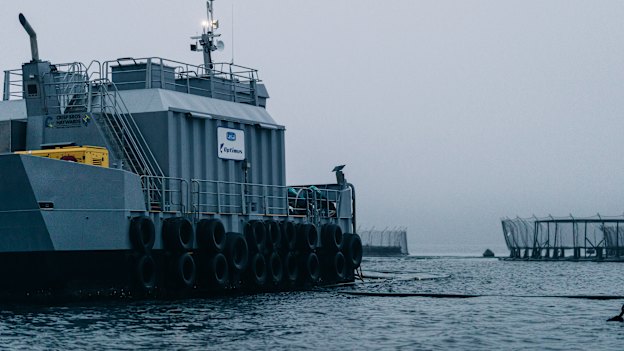 A feeding barge at the Tassal salmon farm on the D’Entrecasteaux Channel houses a diesel plant that powers automated fish feeding. Noise from the site causes distress for the nearby Killora community.