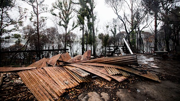 A burnt out house with views over the  Mallacoota Inlet. 