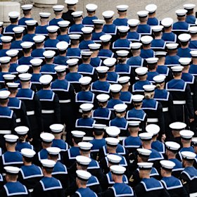 Royal Navy sailors march off the parade ground at Wellington Barracks during Queen Elizabeth II’s state funeral.