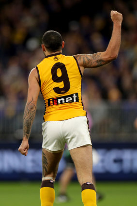 Hawthorn veteran Shaun Burgoyne celebrates a goal.