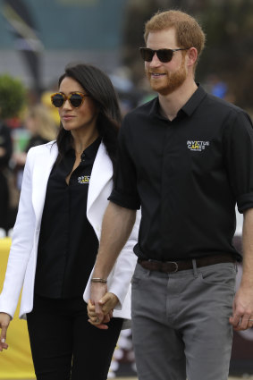 Prince Harry and Meghan visit the Invictus Games driving challenge on Cockatoo Island. 