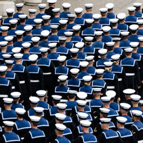 Royal Navy sailors march off the parade ground at Wellington Barracks during Queen Elizabeth II’s state funeral.