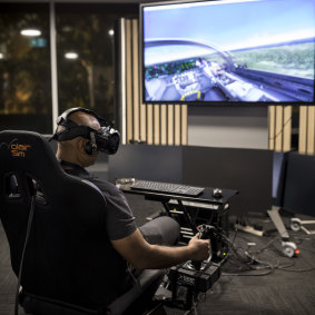Lockheed Martin Australia systems integrator, Vikas Nayak, demonstrating the virtual technology in Canberra. 