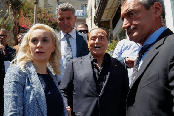 Forza Italia president Silvio Berlusconi, centre, with his partner Marta Fascina, left.