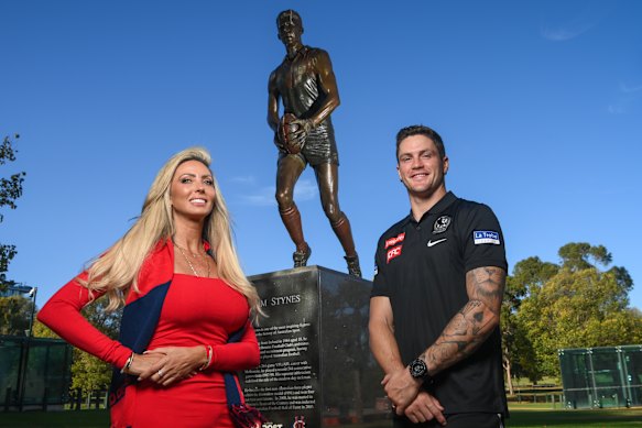 The late Jim Stynes’ sister, Dearbhla, stands proudly with Crisp in front of her brother’s statue outside the MCG.