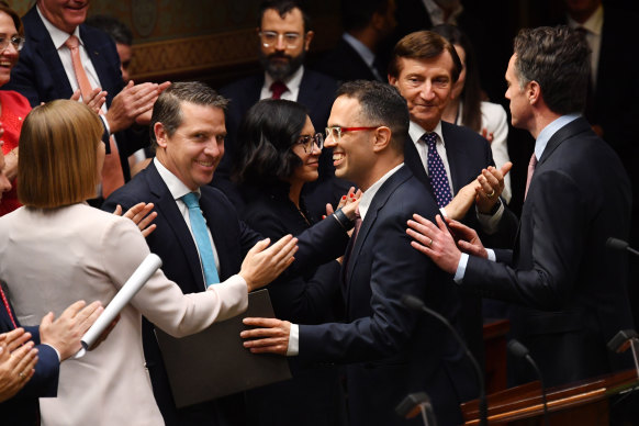 NSW Treasurer Daniel Mookhey is congratulated by his Labor colleagues after delivering the budget.