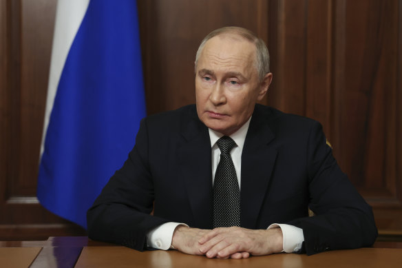 Vladimir Putin records a televised address in Moscow on Thursday.