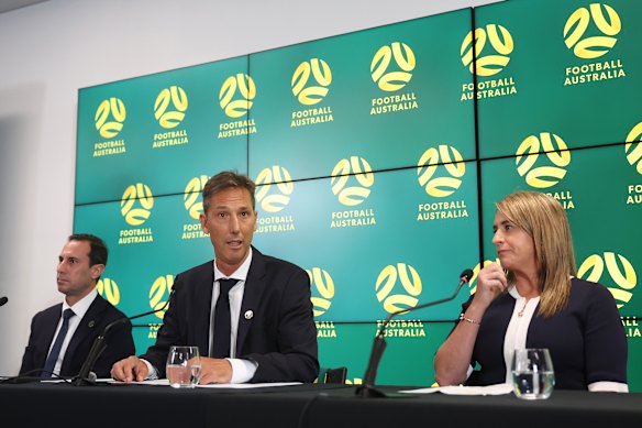 Football Australia’s new chief executive Martin Kugeler, centre. Kugeler, former chief of streaming platform Stan (owned by this masthead), was appointed to the top job at FA last month. 
