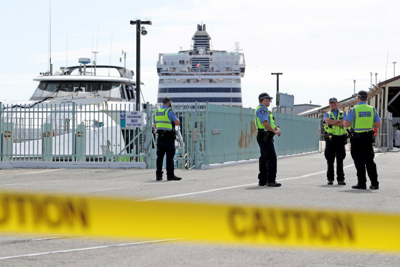 Police are seen at Fremantle Harbour on March 30 as Vasco da Gama passengers prepare for arrival at Rottnest island.