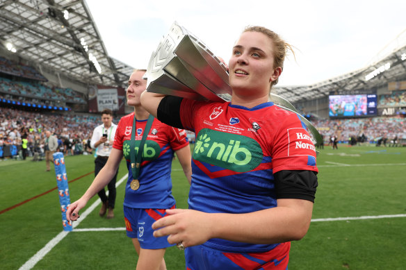 Knights captain Hannah Southwell with the NRLW premiership trophy.