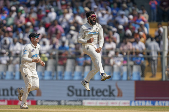 New Zealand’s Aijaz Patel celebrates the wicket of Ravindra Jadeja  on day three.