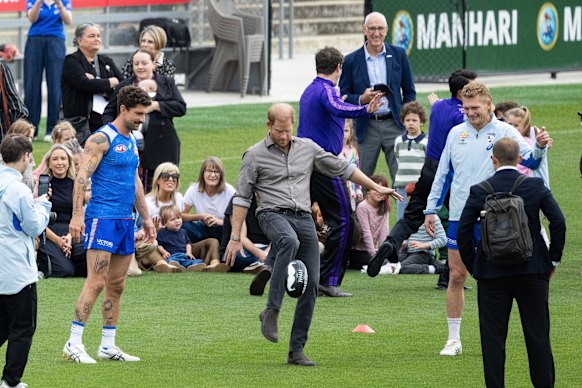 Prince Harry shows off his foot skills.