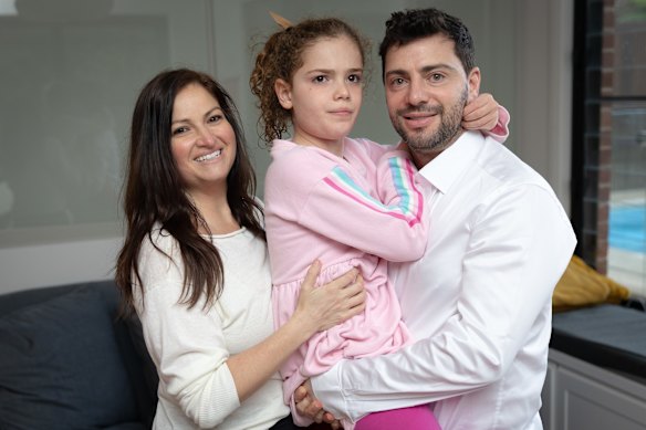 Sasha with her parents, Nadine and David Lipworth.
