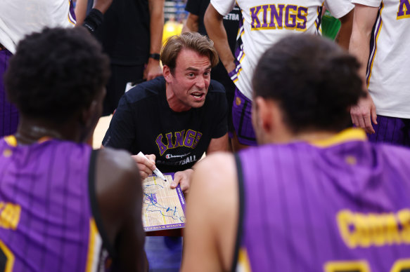 Sydney Kings coach Chase Buford gives a team talk during an NBL Blitz match against the New Zealand Breakers.