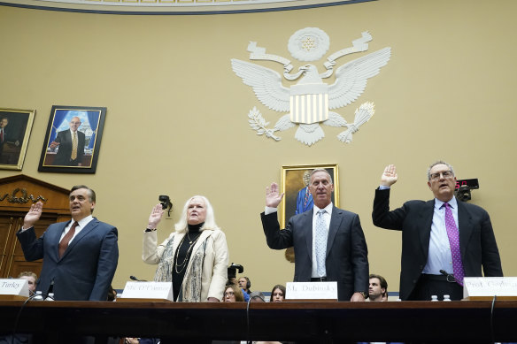 From left: Witnesses Jonathan Turley,  Eileen O’Connor, Bruce Dubinsky and Michael Gerhardt swear in before the first hearing.