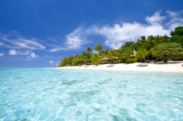 The thatched-roof villas are strung along the beach, with plenty of privacy.