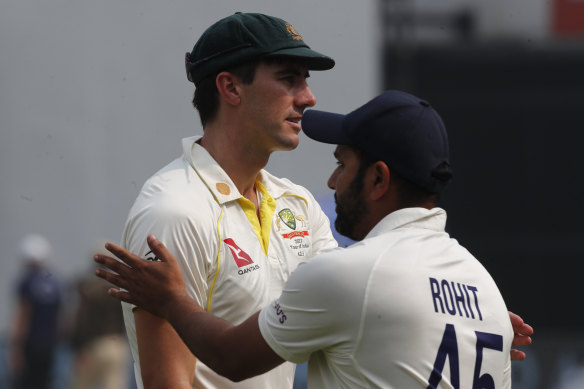 Pat Cummins with India counterpart Rohit Sharma.