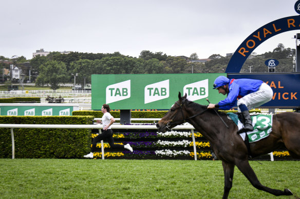 Rohan Browning beats Lost And Running in the “Fastest Race on Turf’ at Royal Randwick.
