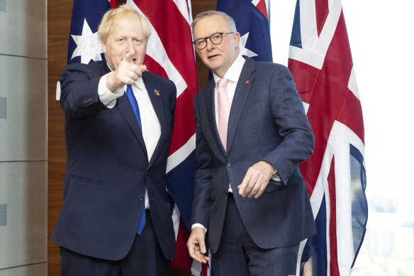 British Prime Minister Boris Johnson meets with Australian Prime Minister Anthony Albanese at a bilateral meeting, during Albanese’s trip to the NATO leaders’ summit in Madrid, Spain, on Wednesday.