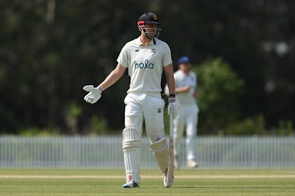 Cameron Green walks off the field after being dismissed by Charlie Stobo for 135 on Monday. 