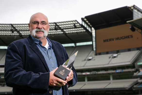 Hughes at the MCG after his induction into the Australian Cricket Hall of Fame in 2021.