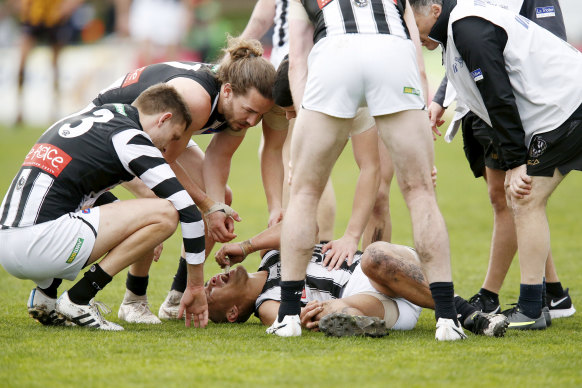 Dampener: Collingwood's Alex Woodward has injured his knee and will require a reconstruction.