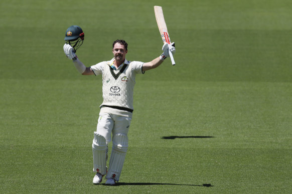 Travis Head celebrates his century in Adelaide.