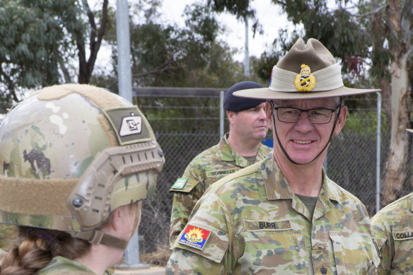 Chief of Army, Lieutenant General Rick Burr, AO, DSC, MVO talks with soldiers from the 1st Armoured Regiment.