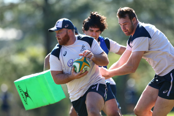 Matt Gibbon carts the ball up during Wallabies training.