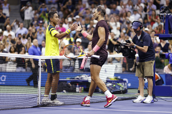 Rafael Nadal shakes hands with Rinky Hijikata after their first-round US Open clash.