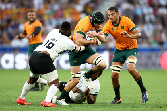 Nick Frost of the Wallabies gains ground against Fiji in Saint-Etienne.