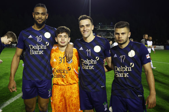 Cannons goalkeeper Ymer Abili (second from left) with teammates (from left) Nicolas Niagioran, Wade Dekker and Allen Korkaric.