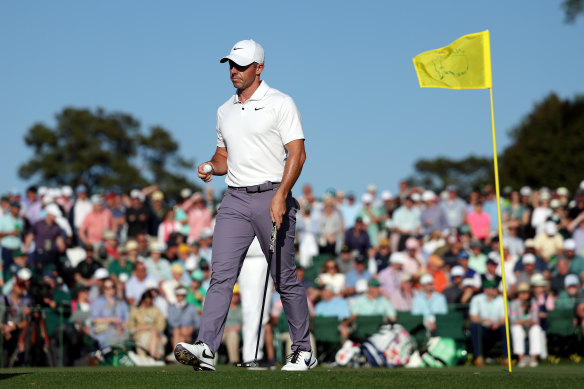 Rory McIlroy of Northern Ireland walks on the 18th green. 