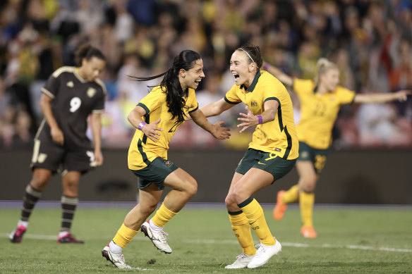 Alex Chidiac celebrates a goal with Caitlin Foord during the Matildas’ Cup of Nations win over Jamaica.