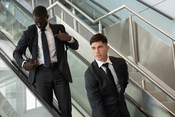 Socceroos World Cup squad members Jason Geria (left) and Cristian Volpato arrive in San Francisco on Sunday.