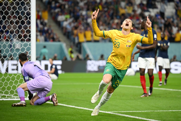 Craig Goodwin celebrates his stunning ninth-minute opener for the Socceroos before his joy proved short-lived.