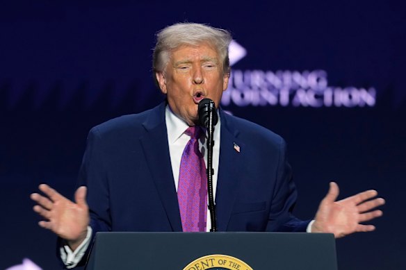 President Donald Trump speaks at a Turning Point USA event at Dream City Church on Friday.