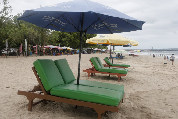 The scene at Kuta beach, Bali, last week. Foreign tourists will be allowed back to the island from Thursday. 