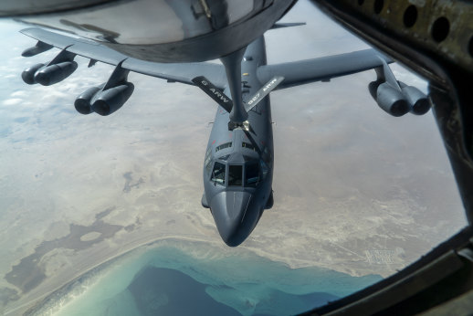 A USAF B-52H “Stratofortress” is refueled by a KC-135 “Stratotanker”.