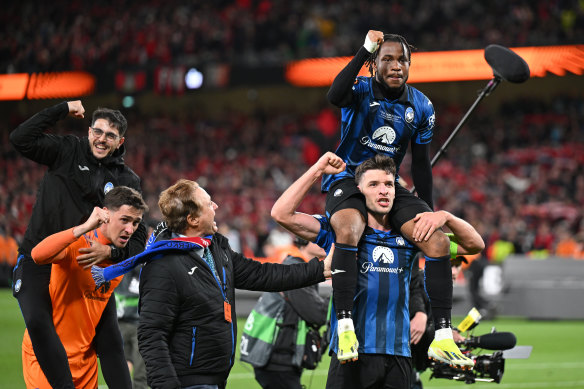 Berat Djimsiti hoists hat-trick hero Ademola Lookman after Atalanta’s Europa League final win over heavy favourites Bayer Leverkusen.