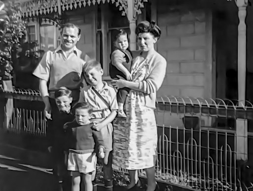 The Carroll family:  Dad Noel and mum Irene with Greg in his mum’s arms, and Ian the eldest child.