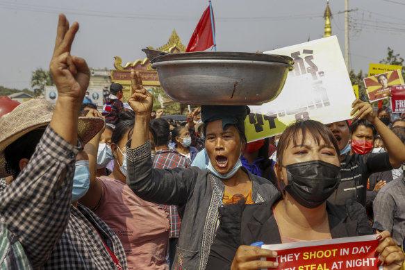 Demonstrators protest against the military junta’s arrest and chagrining of National League for Democracy party MPs in Mandalay, Myanmar.