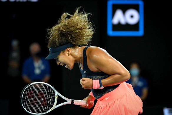 Oh so sweet: Naomi Osaka savours the moment. 