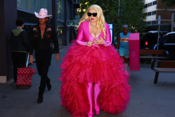 Barbie wants to party: Francesca Packer Barham on the way to her 28th birthday party in Potts Point on Tuesday with new friend Robert Bates in pink cowboy hat.