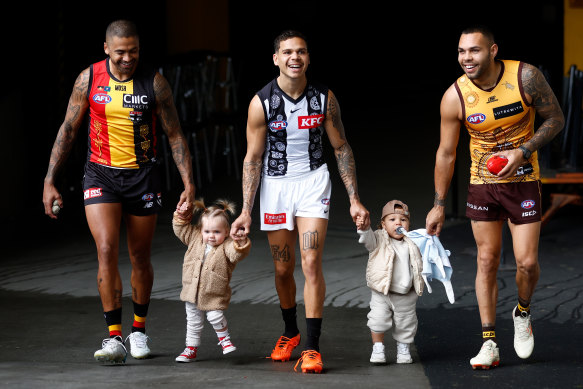 Brad Hill and daughter Harriet, Bobby Hill and son Bobby, and Jarman Impey.