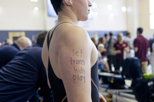 Iszac Henig, a transgender man, prepares to swim in the NCAA women’s competition in March.