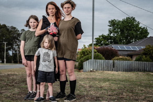 Till Heike and her children Evan (13), Leah (11),Claudia (would have been 6 represented with the penguin) and Lucas (5) at their home near Perth.