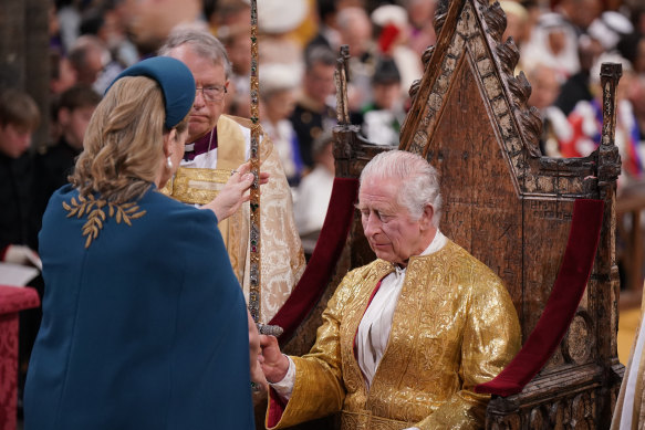 Mordaunt with King Charles III during his coronation ceremony.