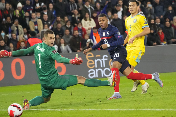 Mbappe sends France’s eighth goal past Kazakhstan.  