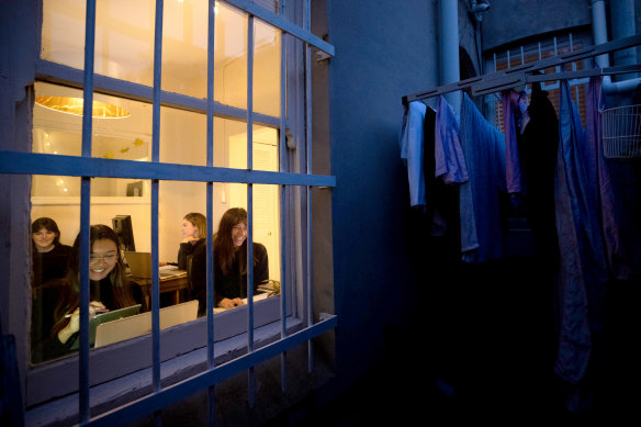 Georgia Rousselot, 25, with her three housemates as they work from home in a Redfern sharehouse.